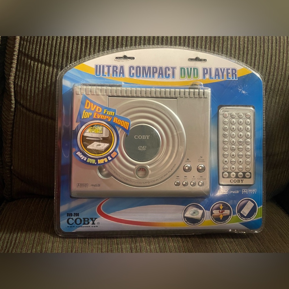 Coby Silver Ultra Compact DVD Player with Remote 206 New in Package Sealed